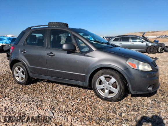 2012 Suzuki SX4 Crossover with VIN JS2YB5A31C6306926, listed as a Copart auction lot 79307604 with 131,762 mi miles and Salvage Title. Bid and sale history available at carsss.com. Image 4.