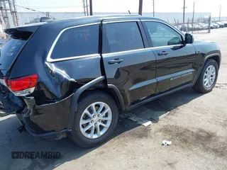 2022 Jeep Grand Cherokee Laredo X with VIN 1C4RJEAG7NC171377, listed as a IAAI auction lot 42592264 with 69,074 mi miles and . Bid and sale history available at DreamBid. Image 4.