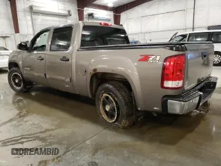 2012 GMC Sierra 1500 SLE with VIN 3GTP2VE73CG227453, listed as a Copart auction lot 52871865 with 133,419 mi miles and Salvage Title. Bid and sale history available at DreamBid. Image 2.