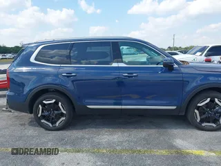2025 Kia Telluride S with VIN 5XYP64GC0SG581646, listed as a IAAI auction lot 42063284 with 12,561 mi miles and . Bid and sale history available at DreamBid. Image 13.