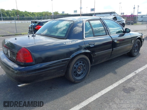 2011 Ford Police Interceptor with VIN 2FABP7BV9BX141326, listed as a IAAI auction lot 42818928 with 110,734 mi miles and . Bid and sale history available at DreamBid. Image 4.