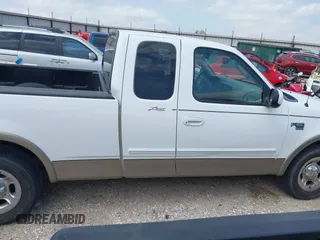 2003 Ford F-150 XL with VIN 1FTRX17L33NB79733, listed as a IAAI auction lot 42023385 with 136,236 mi miles. Bid and sale history available at carsss.com. Image 13.