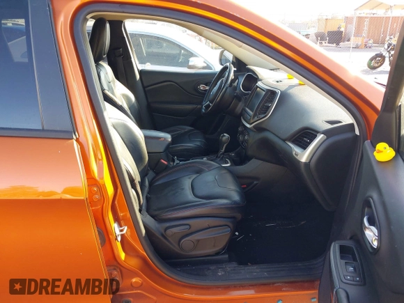 2014 Jeep Cherokee Trailhawk with VIN 1C4PJMBS4EW254879, listed as a IAAI auction lot 41550356 with 101,077 mi miles. Bid and sale history available at carsss.com. Image 5.