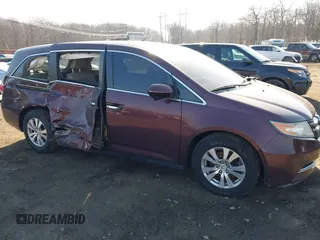 2014 Honda Odyssey EX-L with VIN 5FNRL5H60EB009083, listed as a IAAI auction lot 41633419 with 219,930 mi miles and . Bid and sale history available at carsss.com. Image 6.