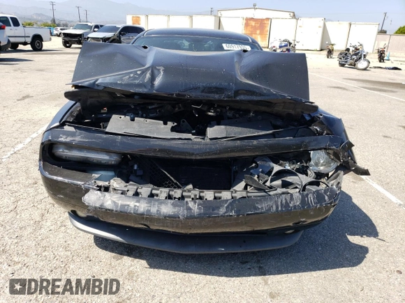 2011 Dodge Challenger z VIN 2B3CJ4DGXBH604602, wystawiony jako Copart lot #60917935 z przebiegiem Nie podano mil oraz Szkoda całkowita • Salvage title. Historia ofert i sprzedaży dostępna na DreamBid. Obrazek 5.