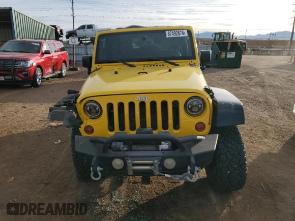 2009 Jeep Wrangler Rubicon with VIN 1J4GA64109L707008, listed as a Copart auction lot 87492674 with 157,104 mi miles and Salvage Title. Bid and sale history available at DreamBid. Image 5.