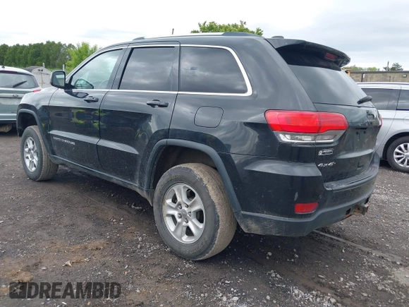 2016 Jeep Grand Cherokee Laredo with VIN 1C4RJFAG2GC436005, listed as a IAAI auction lot 42377859 with 129,724 mi miles and . Bid and sale history available at DreamBid. Image 3.