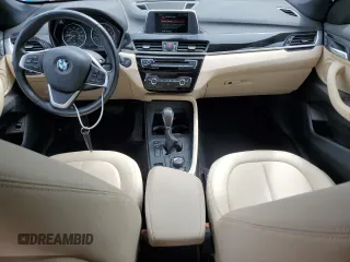 2018 BMW X1 xDrive28i z VIN WBXHT3C33J5F89718, wystawiony jako Copart lot #57726835 z przebiegiem 120 592 mil mil oraz Szkody całkowita. Historia ofert i sprzedaży dostępna na DreamBid. Obrazek 8.
