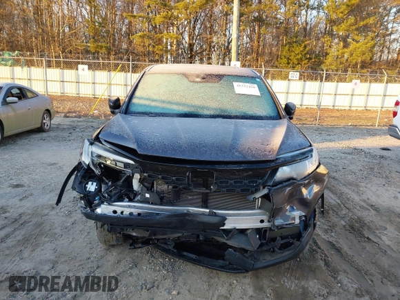 2020 Honda Passport EX-L with VIN 5FNYF7H55LB005906, listed as a IAAI auction lot 41322450 with 66,545 mi miles and . Bid and sale history available at DreamBid. Image 6.