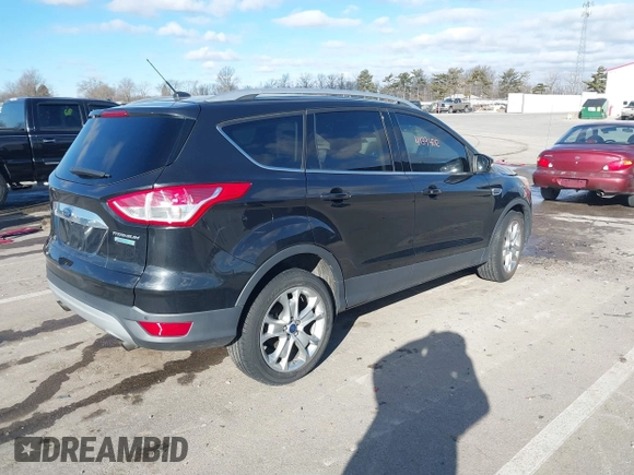 2015 Ford Escape Titanium with VIN 1FMCU0JX8FUC34459, listed as a IAAI auction lot 41394012 with 154,077 mi miles. Bid and sale history available at carsss.com. Image 4.