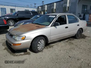 1994 Toyota Corolla with VIN 1NXAE04BXRZ180073, listed as a Copart auction lot 56080254 with 216,558 mi miles and Salvage title. Bid and sale history available at DreamBid. Image 1.