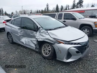 2020 Toyota Prius LE z VIN JTDKARFP9L3161318, wystawiony jako IAAI lot #41913013 z przebiegiem 52 345 mil mil oraz . Historia ofert i sprzedaży dostępna na DreamBid. Obrazek 1.