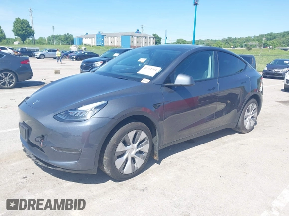 2023 Tesla Model Y Long Range with VIN 7SAYGDEE4PA037218, listed as a IAAI auction lot 42232704 with 18,756 mi miles and . Bid and sale history available at DreamBid. Image 22.