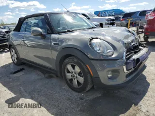 2016 MINI Convertible with VIN WMWWG5C57G3C19380, listed as a Copart auction lot 50645324 with 76,396 mi miles and Salvage title. Bid and sale history available at DreamBid. Image 4.