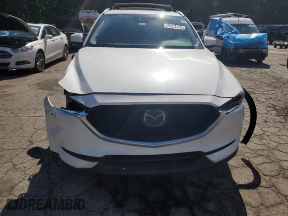 2018 Mazda CX-5 Grand Touring с VIN JM3KFADM3J1351532, выставлен на аукционе Copart как лот 55567405 с пробегом 99 134 миль миль и Списание • Salvage title. История ставок и продаж доступна на DreamBid. Изображение 5.