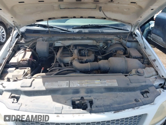 1999 Ford F-150 with VIN 1FTZX1720XKB31945, listed as a IAAI auction lot 42123984 with 187,766 mi miles and . Bid and sale history available at DreamBid. Image 10.