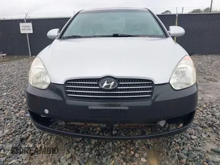 2006 Hyundai Accent GLS with VIN KMHCN46C46U035208, listed as a IAAI auction lot 41769016 with 141,065 mi miles. Bid and sale history available at carsss.com. Image 6.