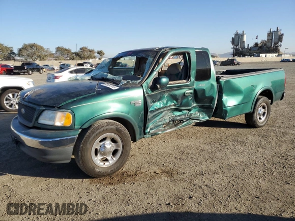 2000 Ford F-150 XL with VIN 1FTRX17W4YNB17453, listed as a Copart auction lot 52051215 with Not provided miles and Salvage title. Bid and sale history available at DreamBid. Image 1.