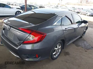 2020 Honda Civic Sedan LX with VIN 2HGFC2F61LH552858, listed as a IAAI auction lot 41554396 with 166,982 mi miles. Bid and sale history available at carsss.com. Image 4.