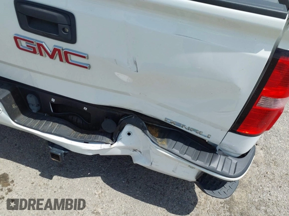 2014 GMC Sierra 1500 Denali z VIN 3GTP1WEC3EG421005, wystawiony jako IAAI lot #41936295 z przebiegiem 188 918 mil mil oraz . Historia ofert i sprzedaży dostępna na DreamBid. Obrazek 19.