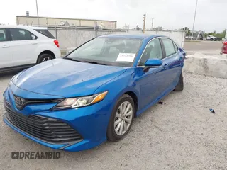 2020 Toyota Camry LE with VIN 4T1L11AK5LU310671, listed as a IAAI auction lot 41732306 with 61,379 mi miles and . Bid and sale history available at carsss.com. Image 18.