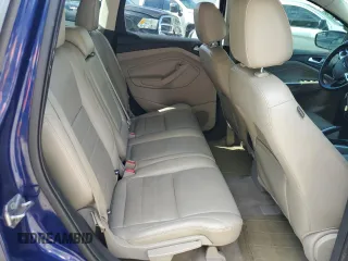 2013 Ford Escape SEL z VIN 1FMCU9HX7DUB98268, wystawiony jako Copart lot #55469915 z przebiegiem 123 619 mil mil oraz Szkoda całkowita • Salvage title. Historia ofert i sprzedaży dostępna na DreamBid. Obrazek 11.