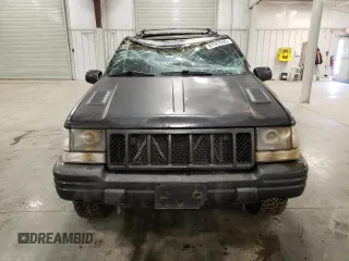 1998 Jeep Grand Cherokee Limited with VIN 1J4GZ88Z3WC165659, listed as a Copart auction lot 87527255 with 203,860 mi miles and Salvage Title. Bid and sale history available at carsss.com. Image 5.