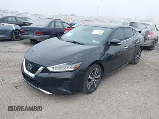 2020 Nissan Maxima SV with VIN 1N4AA6CV3LC360108, listed as a IAAI auction lot 42514852 with 96,640 mi miles and . Bid and sale history available at DreamBid. Image 2.