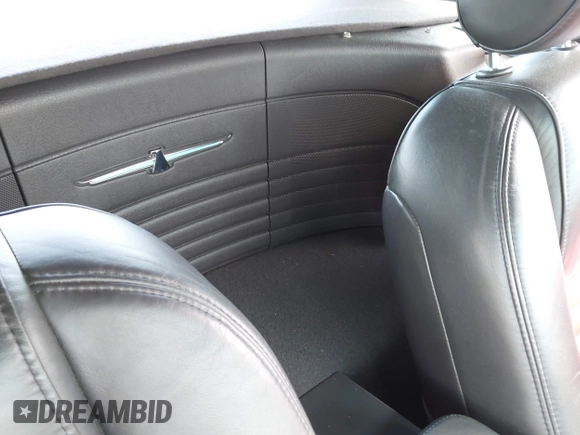 2002 Ford Thunderbird Hardtop Premium with VIN 1FAHP60A02Y130882, listed as a IAAI auction lot 41911737 with 18,521 mi miles and . Bid and sale history available at DreamBid. Image 8.