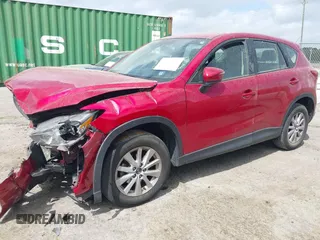 2016 Mazda CX-5 Sport with VIN JM3KE2BY9G0911535, listed as a IAAI auction lot 41906402 with 134,477 mi miles. Bid and sale history available at carsss.com. Image 18.