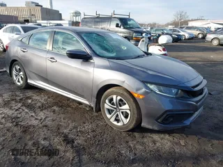 2020 Honda Civic Sedan LX with VIN 2HGFC2F69LH540103, listed as a IAAI auction lot 41629716 with 65,951 mi miles. Bid and sale history available at carsss.com. Image 1.