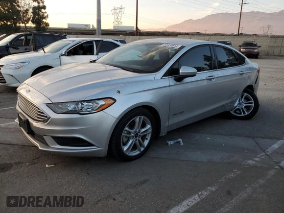 2018 Ford Fusion Hybrid SE with VIN 3FA6P0LU1JR154373, listed as a Copart auction lot 82924614 with 133,065 mi miles and Salvage Title. Bid and sale history available at carsss.com. Image 1.