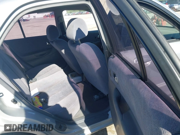 2000 Mazda Protege ES with VIN JM1BJ2213Y0284890, listed as a IAAI auction lot 42088671 with 215,104 mi miles and . Bid and sale history available at DreamBid. Image 8.
