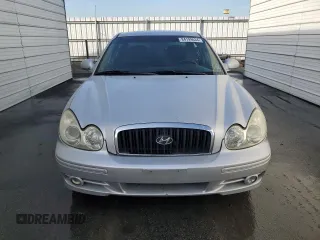 2004 Hyundai Sonata with VIN KMHWF25S04A039620, listed as a Copart auction lot 84199634 with 227,690 mi miles and Salvage Title. Bid and sale history available at carsss.com. Image 5.
