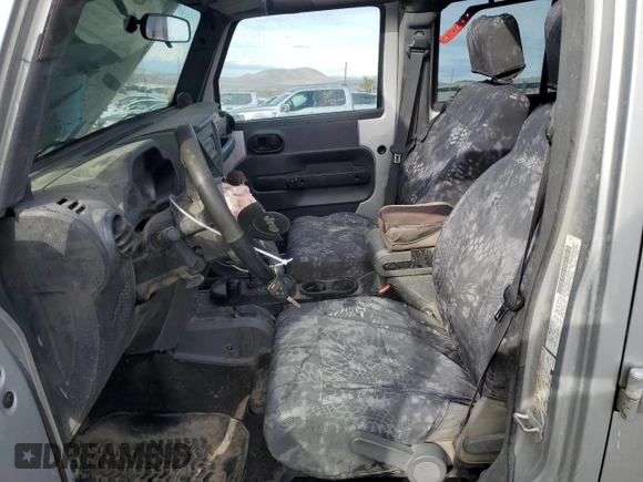 2009 Jeep Wrangler Unlimited Rubicon with VIN 1J8GA69139L703848, listed as a Copart auction lot 43614645 with 172,801 mi miles and Salvage title. Bid and sale history available at DreamBid. Image 7.