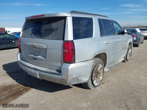 2020 Chevrolet Tahoe LT with VIN 1GNSCBKC5LR226822, listed as a IAAI auction lot 41334853 with 77,091 mi miles. Bid and sale history available at carsss.com. Image 4.
