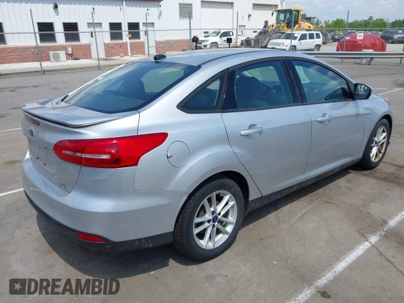 2016 Ford Focus SE with VIN 1FADP3F24GL244241, listed as a IAAI auction lot 42157073 with 85,739 mi miles. Bid and sale history available at carsss.com. Image 4.