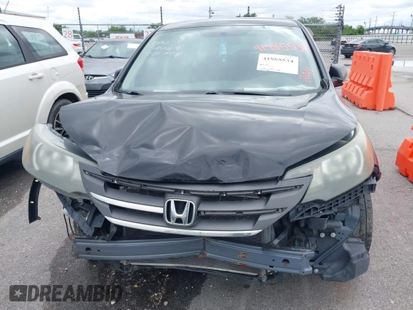 2014 Honda CR-V LX with VIN 3CZRM3H32EG702751, listed as a IAAI auction lot 41985534 with 219,675 mi miles. Bid and sale history available at carsss.com. Image 6.
