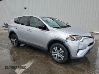 2017 Toyota RAV4 LE with VIN 2T3ZFREV3HW387441, listed as a Copart auction lot 51742245 with 104,823 mi miles and Salvage Title. Bid and sale history available at DreamBid. Image 4.
