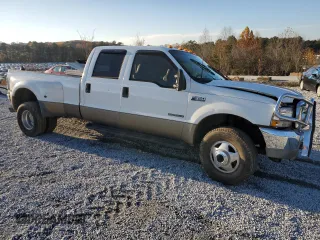 2003 Ford F-350 XL with VIN 1FTWW33F93EA39932, listed as a Copart auction lot 82341464 with 338,158 mi miles and Salvage Title. Bid and sale history available at DreamBid. Image 4.