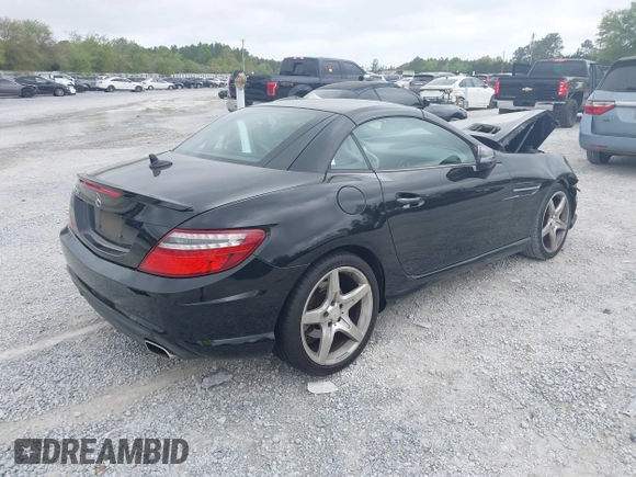 2014 Mercedes-Benz SLK 250 with VIN WDDPK4HA4EF079437, listed as a IAAI auction lot 41958020 with 95,063 mi miles and . Bid and sale history available at DreamBid. Image 4.