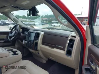 2015 Ram 1500 Laramie z VIN 1C6RR7JM8FS501701, wystawiony jako IAAI lot #42224424 z przebiegiem 59 591 mil mil oraz . Historia ofert i sprzedaży dostępna na DreamBid. Obrazek 5.
