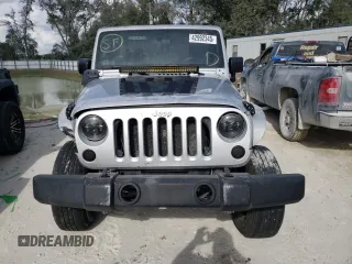 2011 Jeep Wrangler Sport with VIN 1J4GA2D15BL592081, listed as a Copart auction lot 42992345 with 139,364 mi miles and Salvage Title. Bid and sale history available at carsss.com. Image 5.