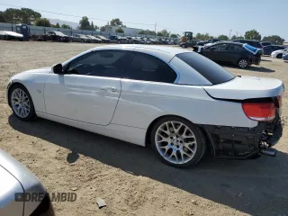 2010 BMW 3 Series 335i with VIN WBAWL7C5XAP476117, listed as a Copart auction lot 61328335 with 142,700 mi miles and Salvage title. Bid and sale history available at DreamBid. Image 2.