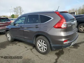 2015 Honda CR-V EX-L with VIN 2HKRM4H79FH617056, listed as a Copart auction lot 50390375 with 73,701 mi miles and Salvage Title. Bid and sale history available at carsss.com. Image 2.