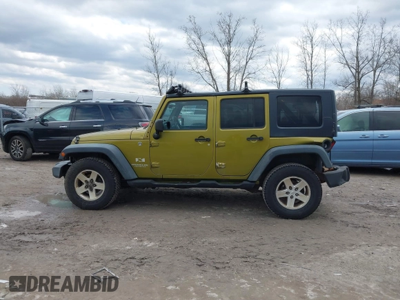 2008 Jeep Wrangler Unlimited X with VIN 1J4GA39158L529523, listed as a IAAI auction lot 41979992 with 304,641 mi miles and . Bid and sale history available at DreamBid. Image 14.
