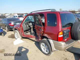 2002 Suzuki Grand Vitara JLX z VIN JS3TD62V824152943, wystawiony jako IAAI lot #41668395 z przebiegiem 104 191 mil mil oraz . Historia ofert i sprzedaży dostępna na DreamBid. Obrazek 3.