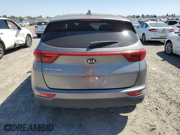 2017 Kia Sportage LX z VIN KNDPMCAC9H7159793, wystawiony jako Copart lot #56603345 z przebiegiem 157 860 mil mil oraz Szkoda całkowita • Salvage title. Historia ofert i sprzedaży dostępna na DreamBid. Obrazek 6.