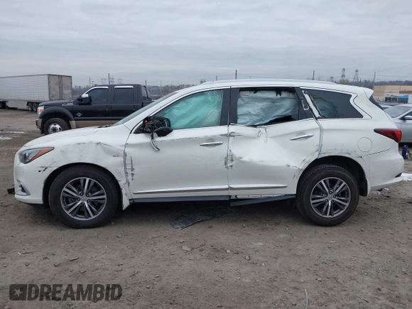 2016 Infiniti QX60 with VIN 5N1AL0MM1GC520429, listed as a IAAI auction lot 41286912 with 65,512 mi miles and . Bid and sale history available at DreamBid. Image 6.