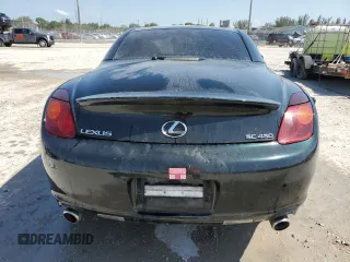 2003 Lexus SC 430 z VIN JTHFN48Y930048533, wystawiony jako Copart lot #57091815 z przebiegiem Nie podano mil oraz Szkody całkowita. Historia ofert i sprzedaży dostępna na DreamBid. Obrazek 6.